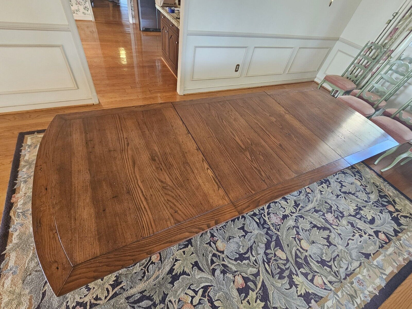 Wormy Chestnut Dining Table & 8 Chair Set 114 Inches Long On Modified Base